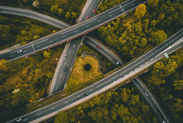 aerial photography of interlocking freeways with travelling cars