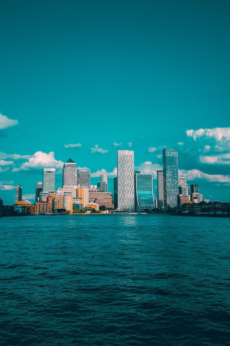 city skyline across body of water during daytime